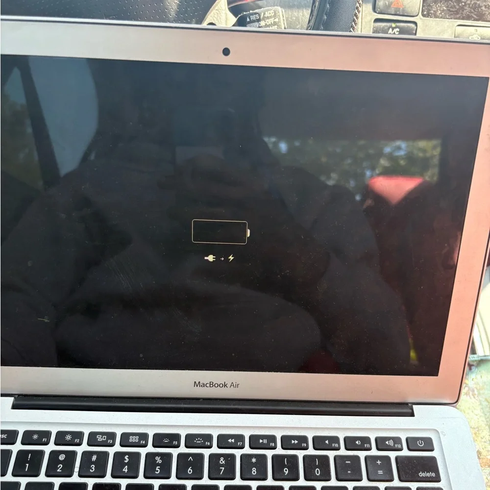 Apple Laptop with Silver Finish and Sticker. 2015